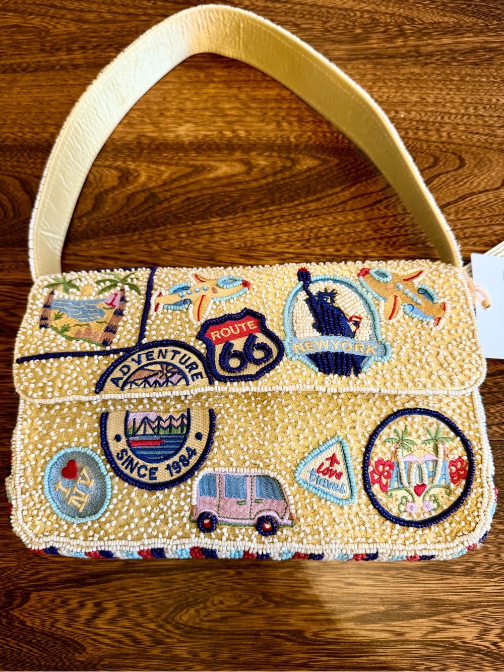 Viral Cream Beaded Shoulder Bag with Travel Patches of American Adventures